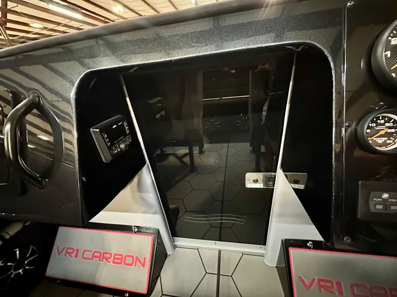 Slide: The Image of 2022 Velocity VR1 interior with carbon accents and modern dashboard design. - 28