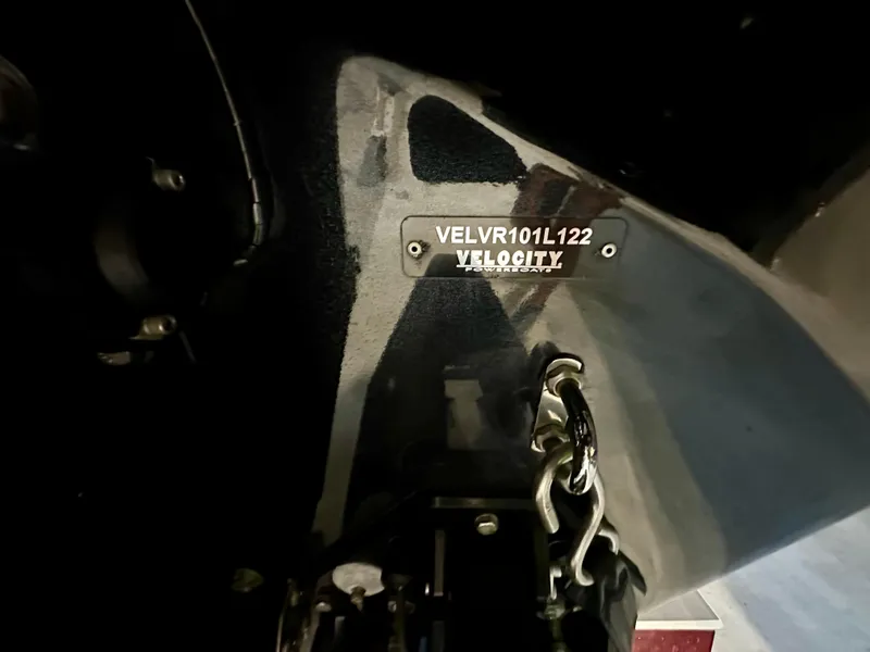 Slide: The Image of 2022 Velocity VR1 boat hull with identification plate and chain detail. - 37