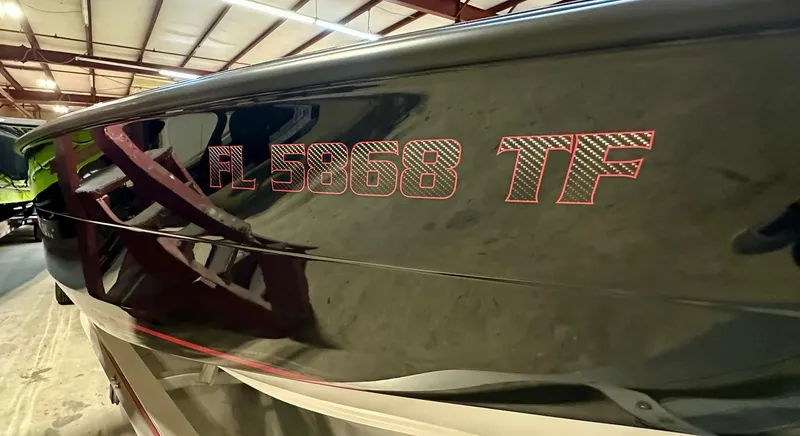 Slide: The Image of 2022 Velocity VR1 boat with registration FL 5868 TF in a warehouse. - 38