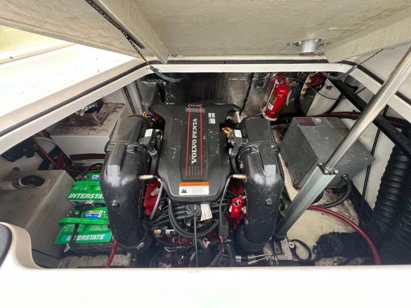 Slide: The Image of Engine compartment of a 2015 Regal 28 Express boat with Volvo Penta engine. - 24
