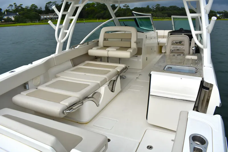 Slide: The Image of 2023 Boston Whaler 320 Vantage boat interior with seating and amenities. - 26