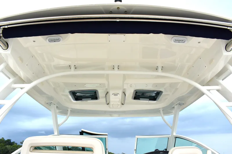 Slide: The Image of 2023 Boston Whaler 320 Vantage boat canopy with sleek design and integrated lighting. - 29