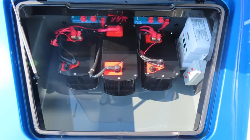 Slide: The Image of MTI 390X 2023 battery compartment with wiring and components. - 13