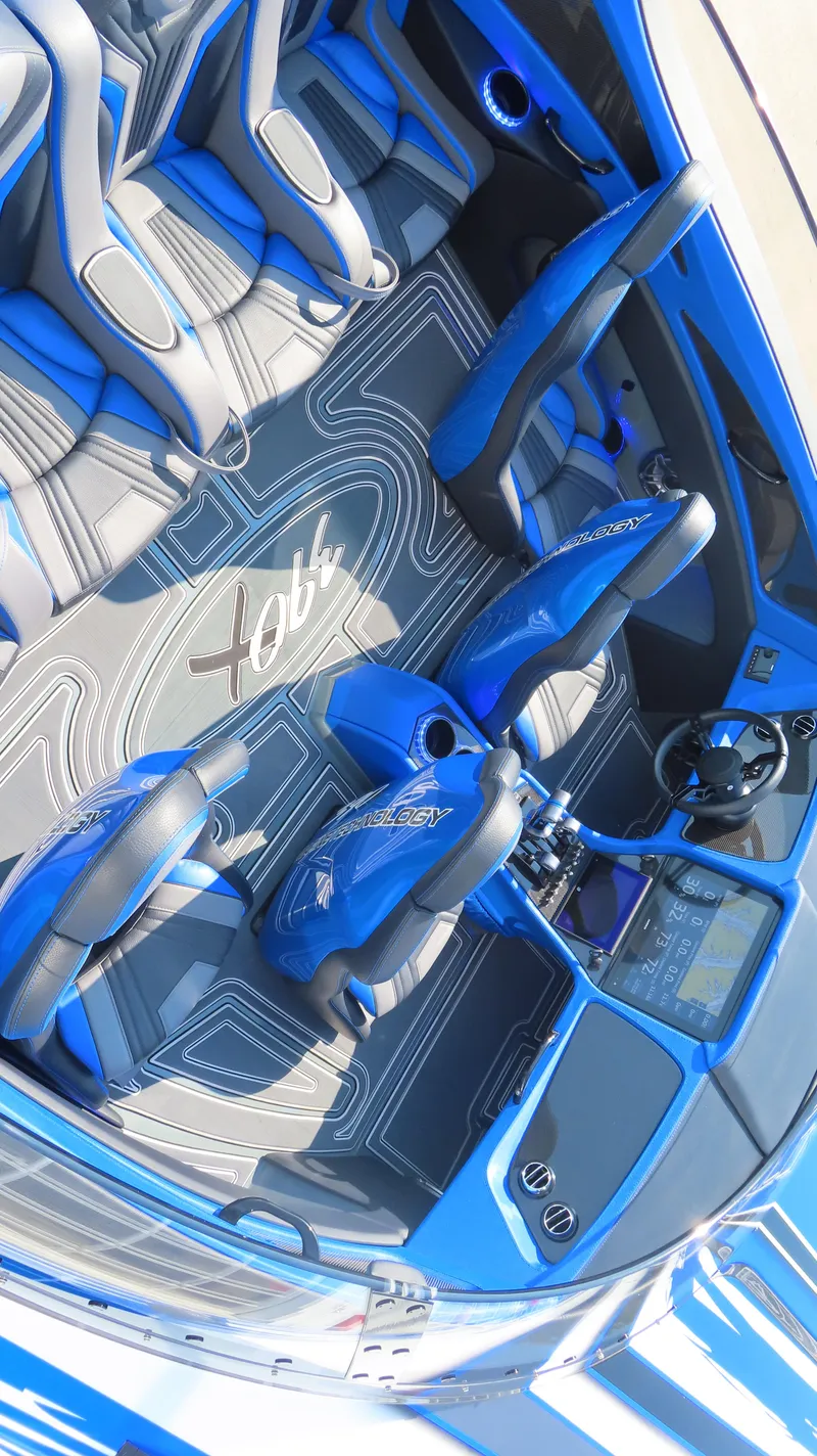 Slide: The Image of 2023 MTI 390X interior with blue accents and modern design. - 25