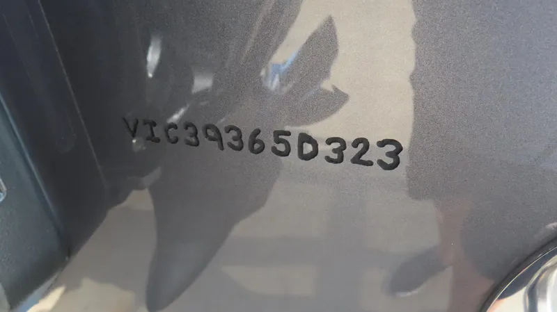 Slide: The Image of VIN number on MTI 390X, 2023 model, close-up view. - 8