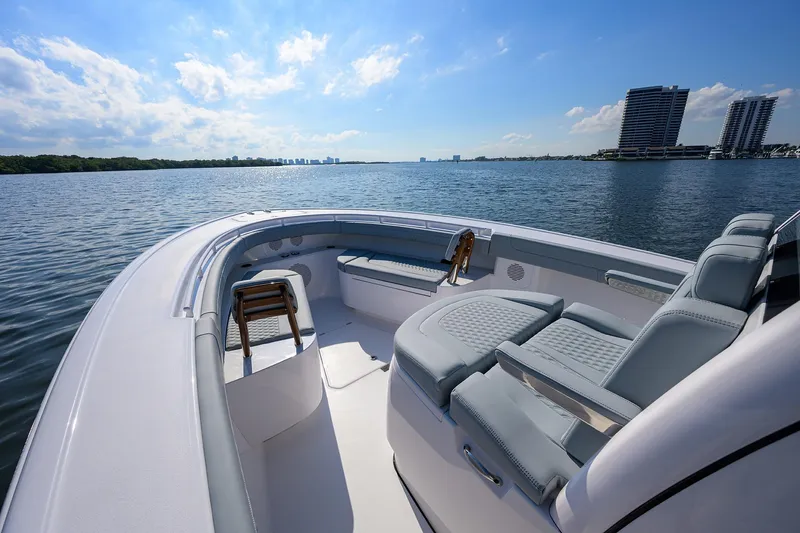 Slide: The Image of 2026 Phenom 34 Center Console boat on calm water with modern seating. - 22