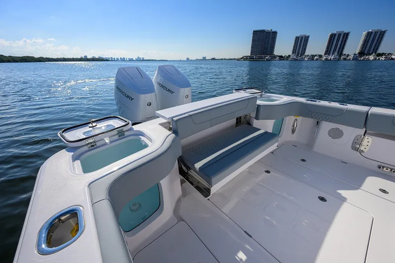 Slide: The Image of 2026 Phenom 34 Center Console boat with Mercury engines on a sunny day. - 36