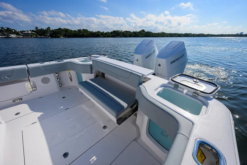 Slide: The Image of 2026 Phenom 34 Center Console boat with dual Mercury engines on a sunny day. - 37