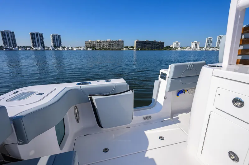 Slide: The Image of 2026 Phenom 34 Center Console boat interior with waterfront cityscape view. - 41