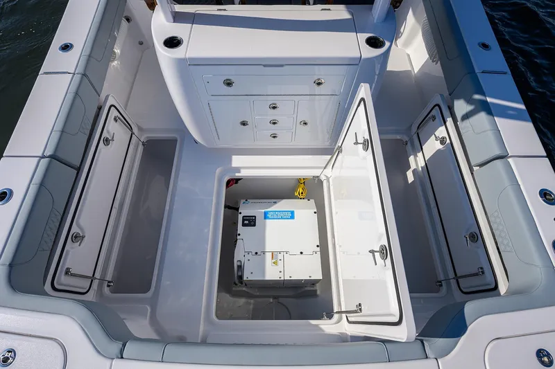 Slide: The Image of 2026 Phenom 34 Center Console boat interior with open storage compartments. - 48