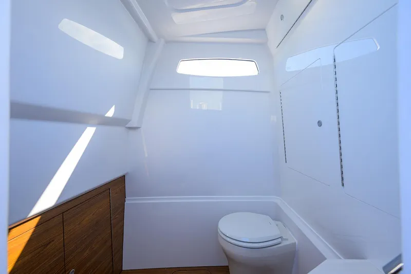 Slide: The Image of 2026 Phenom 34 Center Console boat interior with modern bathroom amenities. - 51