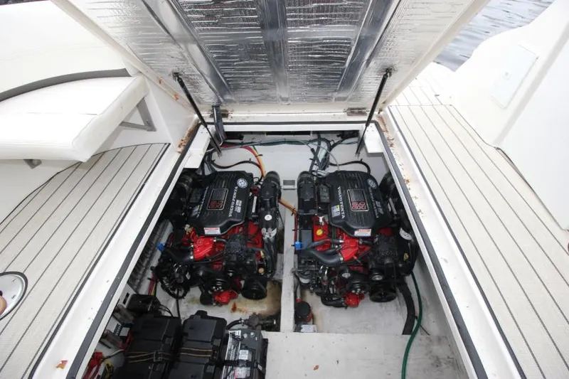 Slide: The Image of Engine compartment of 2006 Cruisers Yachts 320 Express with twin engines visible. - 31