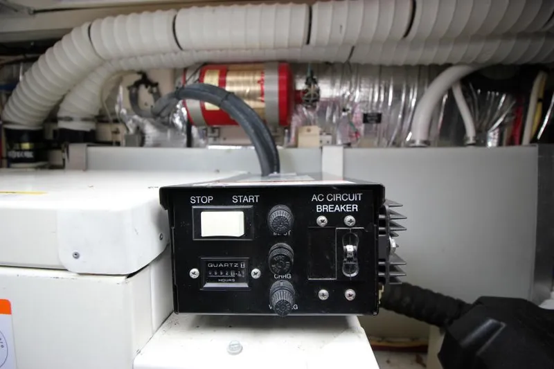 Slide: The Image of Control panel in the engine room of a 2006 Cruisers Yachts 320 Express. - 32