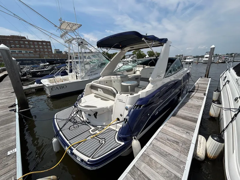 Slide: The Image of 2013 Monterey 280 SCR boat docked at marina under clear sky. - 3