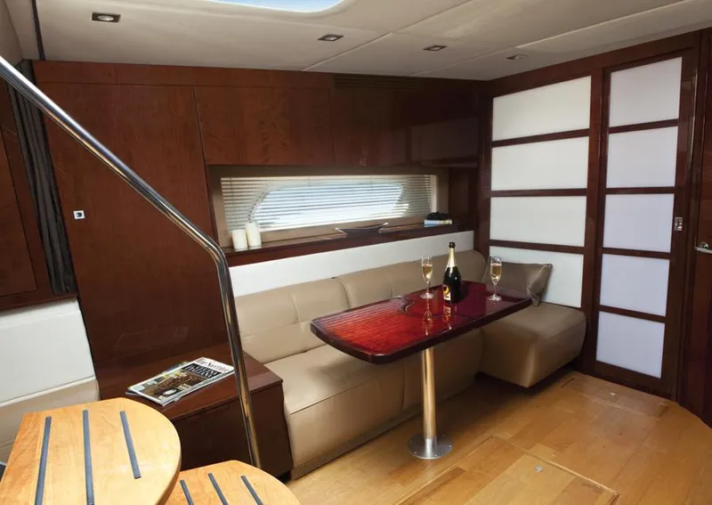 Slide: The Image of Manufacturer Provided Image: Luxurious interior of 2013 Sea Ray 450 Sundancer yacht with elegant seating and dining area. - 5