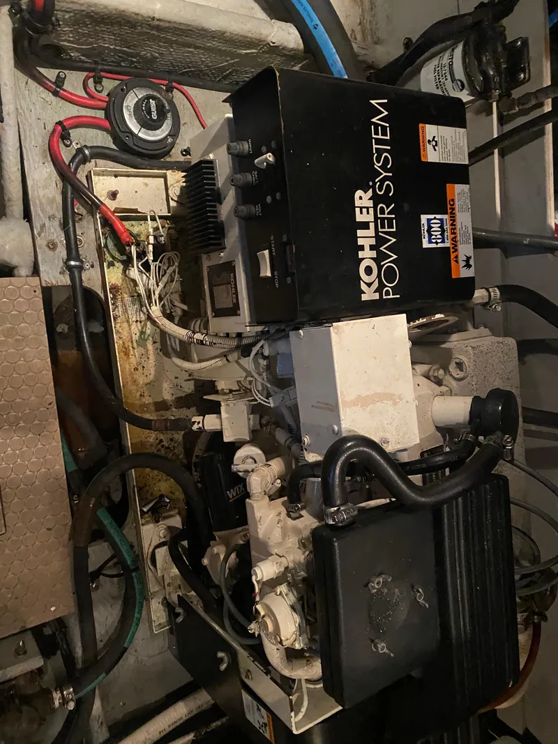 Slide: The Image of Engine room of 1997 Silverton 372 Motor Yacht with Kohler power system. - 42