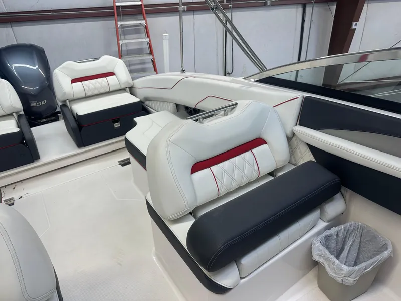 Slide: The Image of 2022 Regal LX4 boat interior with luxurious seating and modern design. - 12