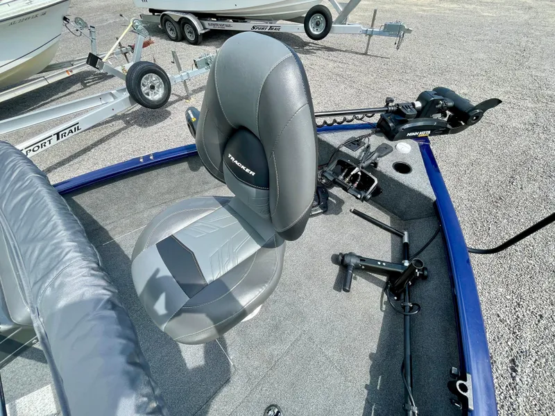 Slide: The Image of 2020 Tracker Pro Guide V-175 Combo boat interior with seating and equipment. - 12