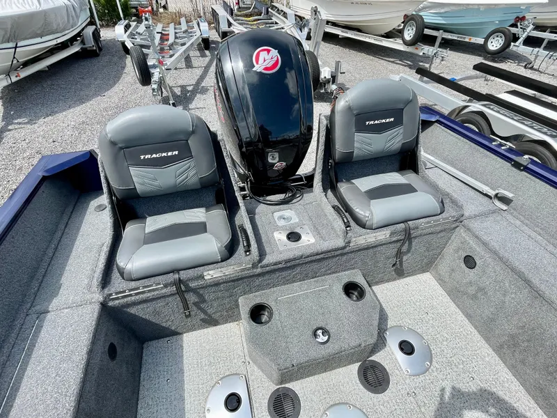 Slide: The Image of 2020 Tracker Pro Guide V-175 Combo boat interior with dual seats and motor. - 15