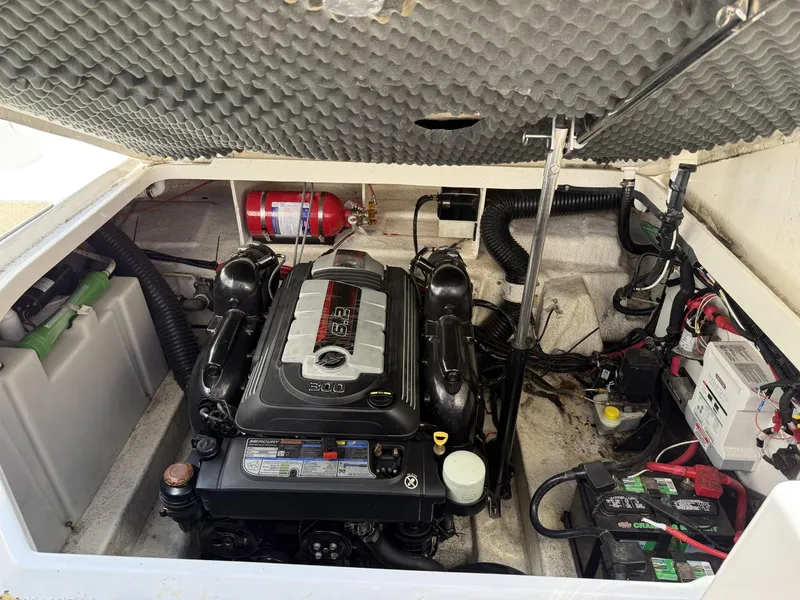 Slide: The Image of Engine compartment of a 2017 Sea Ray Sundancer 280 boat, featuring a 6.2L engine. - 19