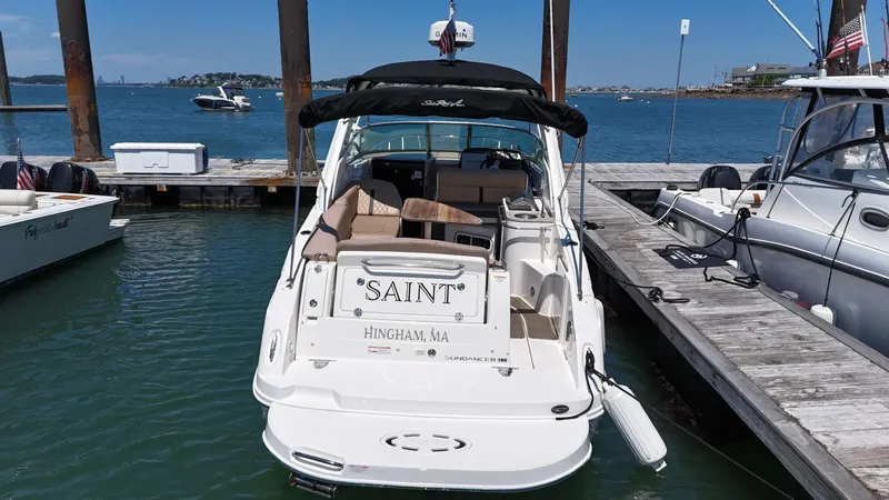 Slide: The Image of 2017 Sea Ray Sundancer 280 docked at marina, Hingham, MA, with clear blue water background. - 4