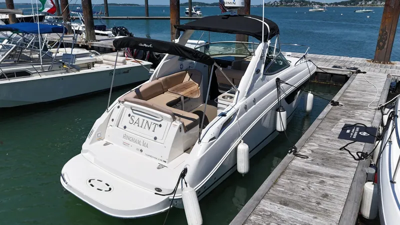 Slide: The Image of 2017 Sea Ray Sundancer 280 docked at marina, featuring sleek design and comfortable seating. - 5