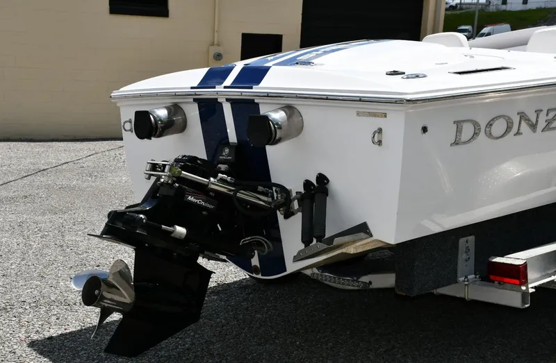Slide: The Image of 2007 Donzi Carol Shelby 22 Classic boat rear view with MerCruiser engine. - 11