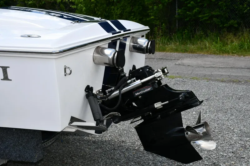 Slide: The Image of 2007 Donzi Carol Shelby 22 Classic boat with MerCruiser engine, rear view. - 13