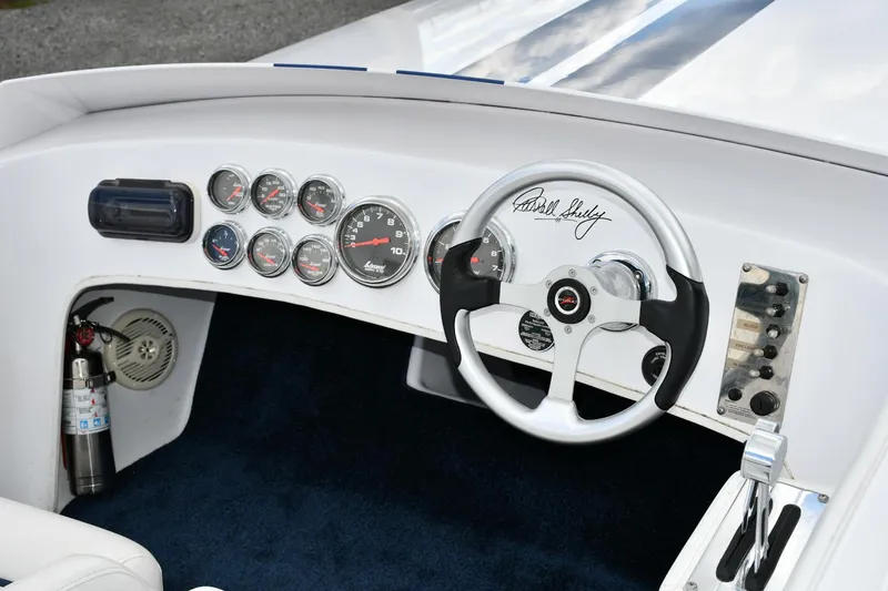Slide: The Image of 2007 Donzi Carol Shelby 22 Classic dashboard with gauges and signed steering wheel. - 7
