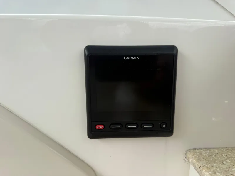 Slide: The Image of Garmin display on 2018 Robalo R247 Dual Console boat dashboard. - 26