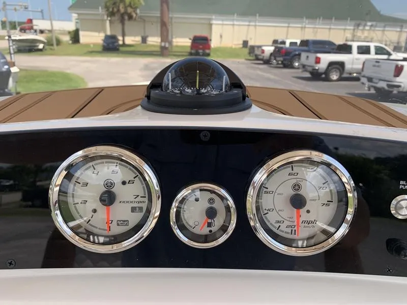 Slide: The Image of Dashboard of 2026 Pioneer ISLANDER 202 boat with gauges and compass. - 17