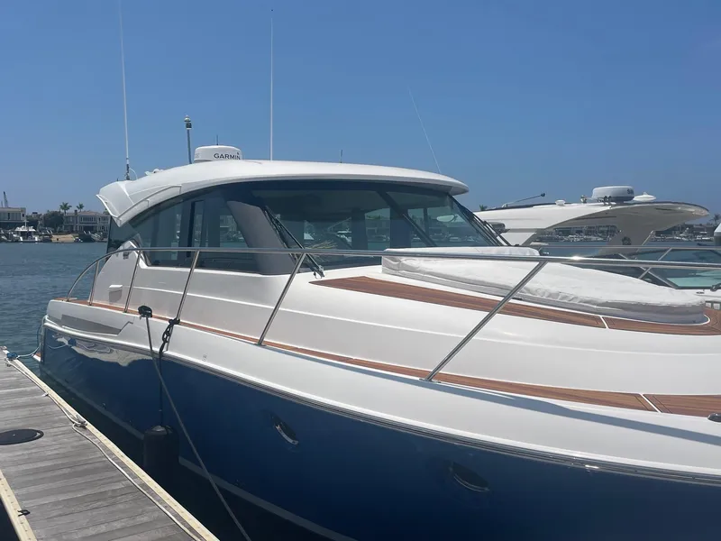 The Image of 2020 Tiara Yachts 39 Coupe docked, showcasing sleek design and modern features. - 0