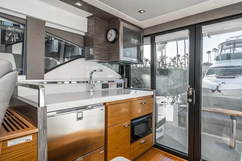 Slide: The Image of Modern kitchen interior of 2020 Tiara Yachts 39 Coupe with sleek design and appliances. - 10