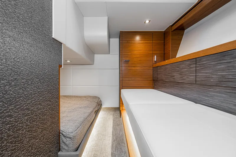 Slide: The Image of Interior cabin of 2020 Tiara Yachts 39 Coupe, featuring modern design and comfortable seating. - 39