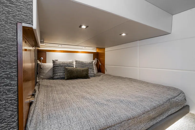 Slide: The Image of Luxurious cabin interior of 2020 Tiara Yachts 39 Coupe with cozy bedding. - 41