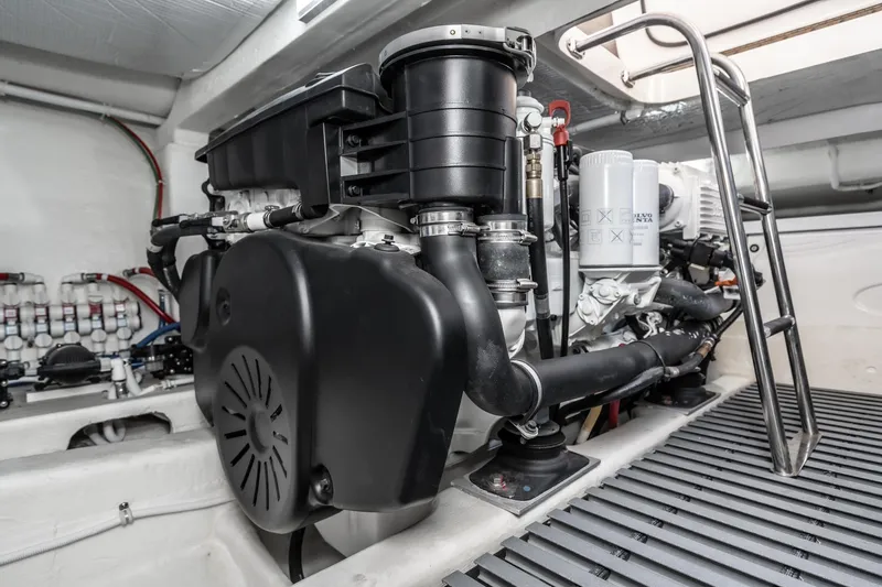 Slide: The Image of Engine room of 2020 Tiara Yachts 39 Coupe, showcasing mechanical components and systems. - 44