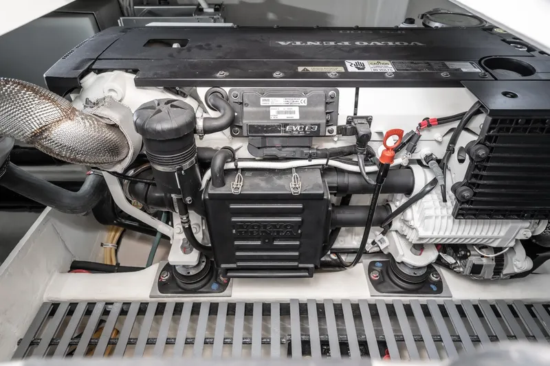 Slide: The Image of Engine compartment of a 2020 Tiara Yachts 39 Coupe, showcasing detailed mechanical components. - 45