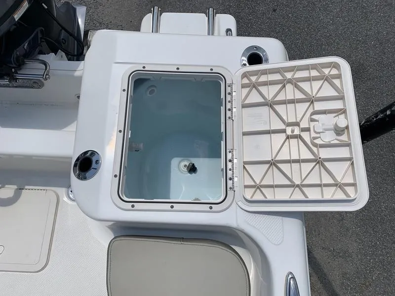 Slide: The Image of Open storage compartment on a 2021 Key West 176cc boat, showing interior details. - 11