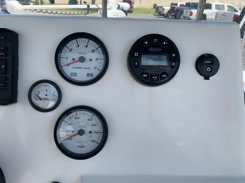 Slide: The Image of Dashboard of 2021 Key West 176cc boat with gauges and controls. - 20