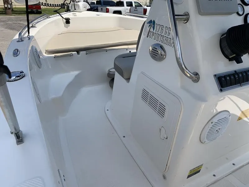 Slide: The Image of 2021 Key West 176cc boat interior with seating and control panel. - 21