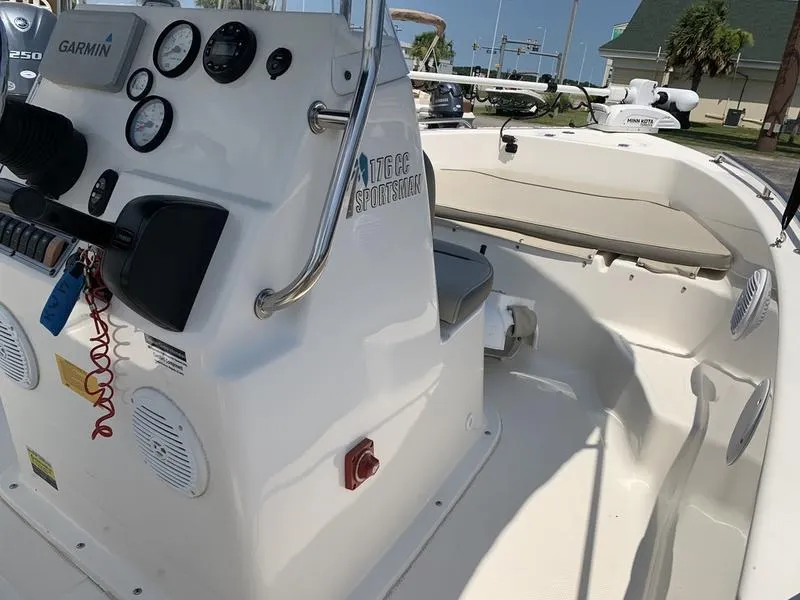 Slide: The Image of 2021 Key West 176cc boat interior with Garmin controls and seating. - 22