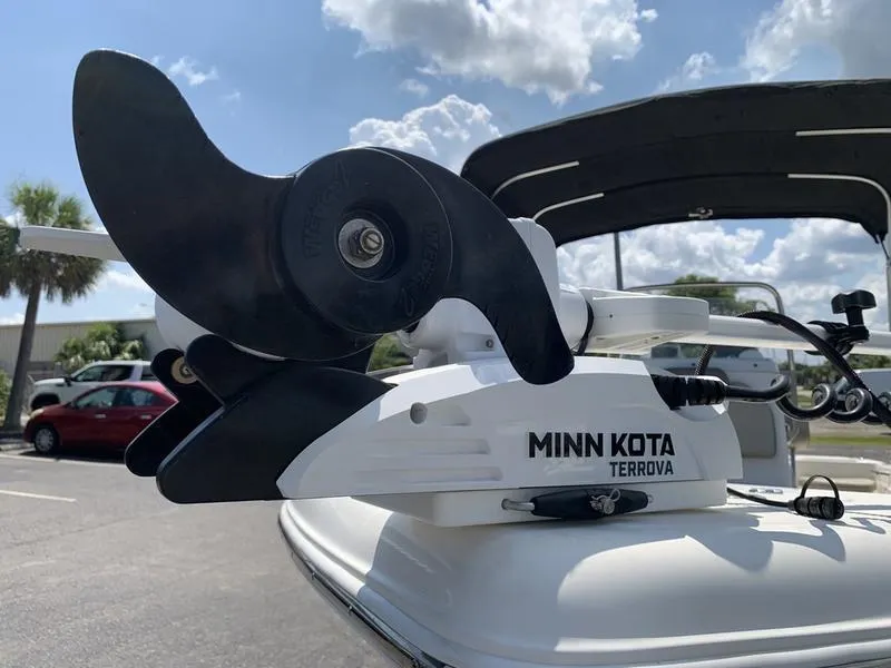 Slide: The Image of Minn Kota Terrova motor on 2021 Key West 176cc boat under sunny sky. - 9