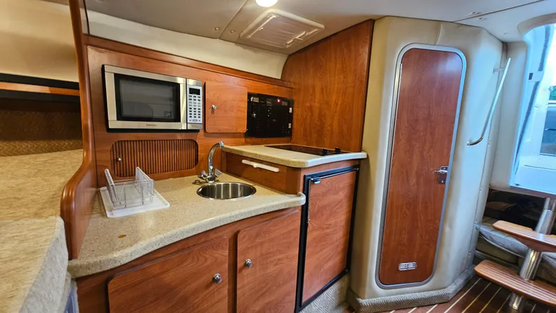 Slide: The Image of Rinker 320 Express Cruiser 2006 - 21