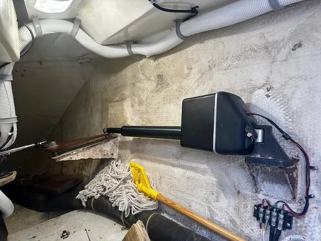Slide: The Image of Interior of 1986 Hunter Legend 45 sailboat showing steering mechanism and ropes. - 10