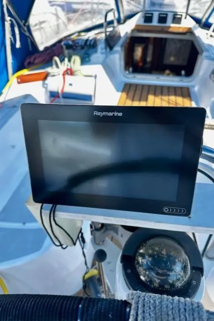 Slide: The Image of Cockpit of 1986 Hunter Legend 45 sailboat with Raymarine navigation display. - 23