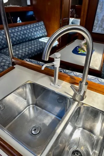 Slide: The Image of Stainless steel sink and faucet in 1986 Hunter Legend 45 yacht interior. - 37