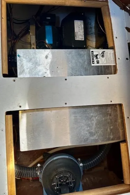 Slide: The Image of 1986 Hunter Legend 45 engine compartment with visible components and wiring. - 44