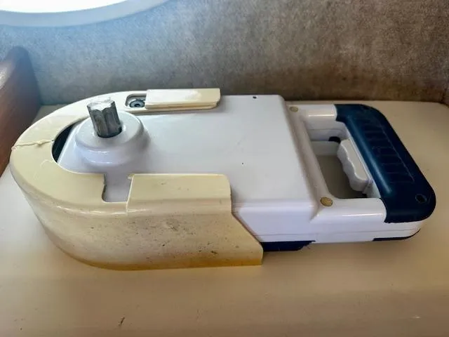 Slide: The Image of Old manual winch handle on a 1986 Hunter Legend 45 sailboat. - 46