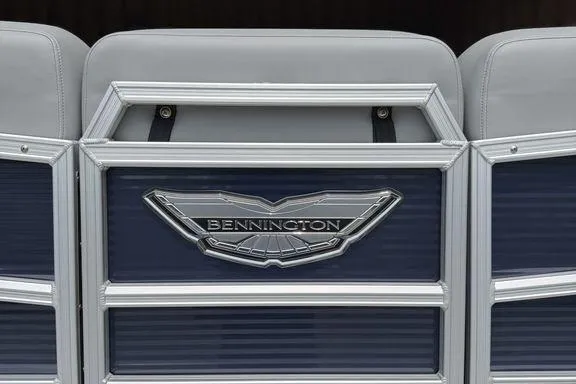 Slide: The Image of 2026 Bennington M Quad Bench 24 MFB with sleek design and logo detail. - 4