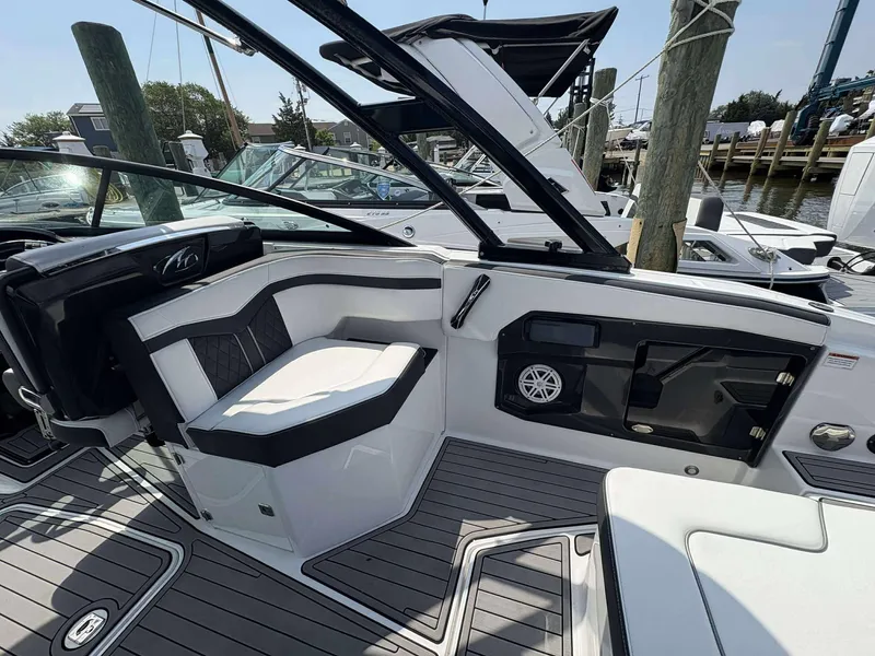 Slide: The Image of 2021 Monterey 255 Super Sport boat interior with sleek seating and modern design. - 10